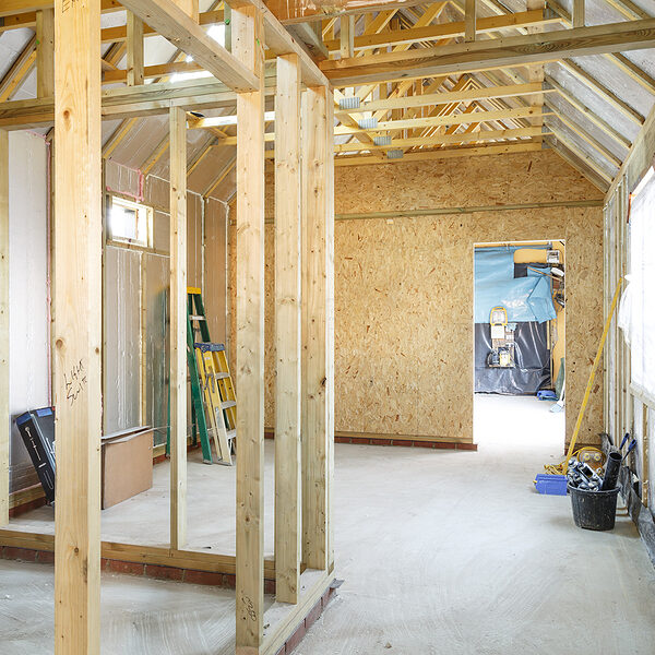 Modern timber house construction with rigid insulation boards